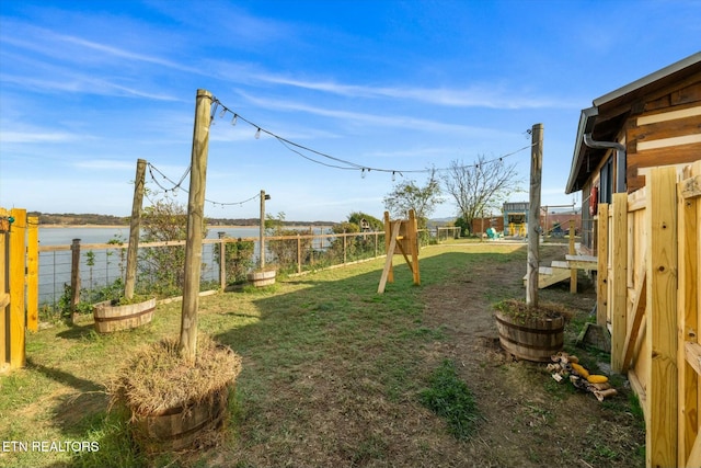 view of yard with a water view