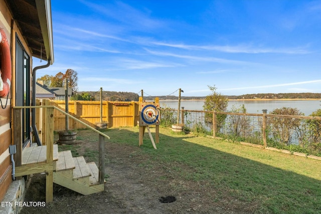 view of yard with a water view