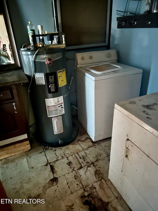 laundry area featuring washer / clothes dryer and electric water heater