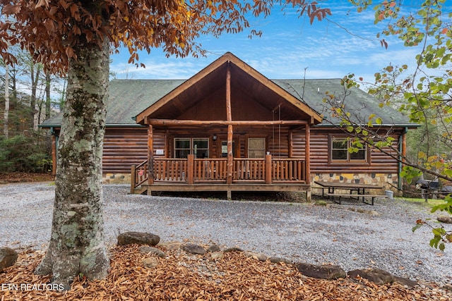 view of log cabin