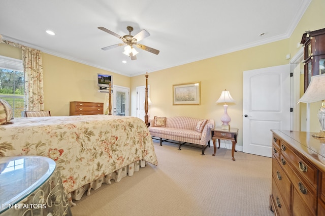 bedroom featuring light colored carpet, ceiling fan, and ornamental molding