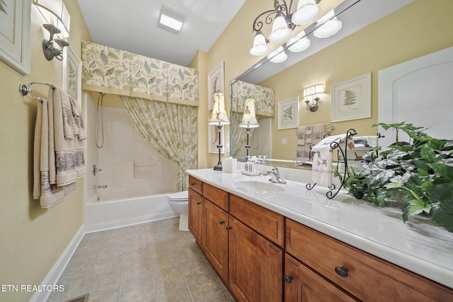 full bathroom with tile patterned floors, vanity, bathing tub / shower combination, a chandelier, and toilet