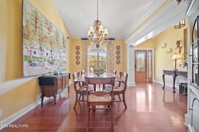 dining area featuring vaulted ceiling, dark hardwood / wood-style floors, and an inviting chandelier