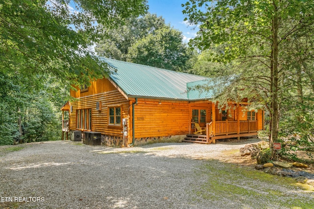 view of front of house with a wooden deck