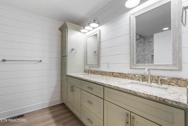 bathroom with vanity and wood-type flooring