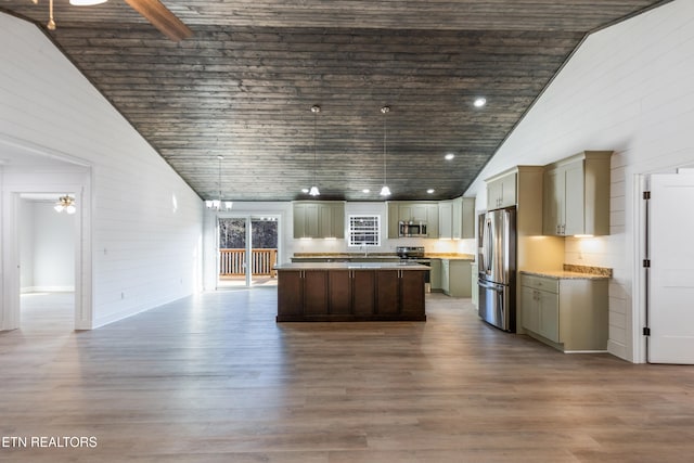 kitchen featuring appliances with stainless steel finishes, high vaulted ceiling, light stone countertops, a kitchen island, and dark hardwood / wood-style flooring