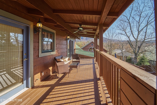 wooden terrace with ceiling fan