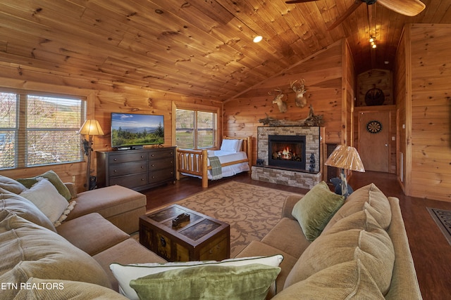 living room featuring hardwood / wood-style floors, wooden ceiling, wooden walls, and vaulted ceiling