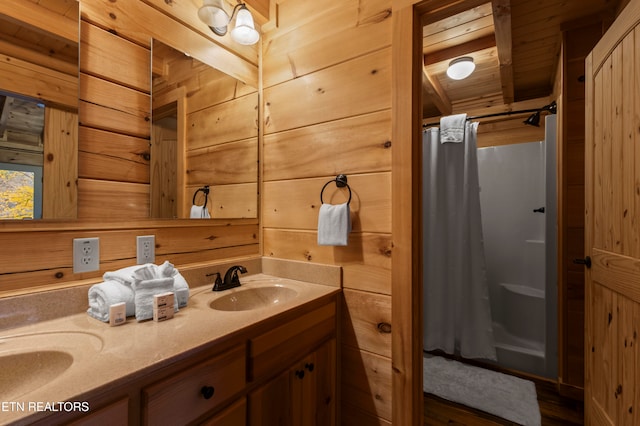 bathroom with vanity, wooden ceiling, wooden walls, and a shower with shower curtain