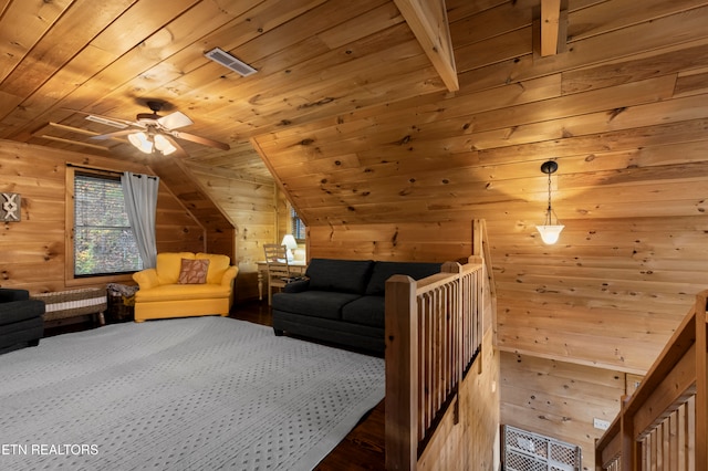 interior space featuring wood ceiling, wood walls, and lofted ceiling