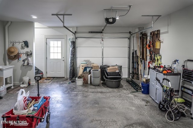 garage featuring a garage door opener