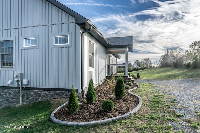 view of home's exterior featuring a yard