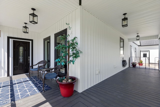 deck with covered porch