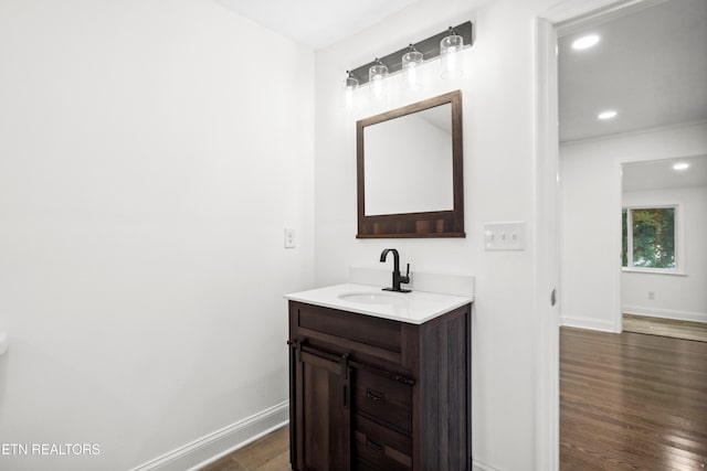 bathroom featuring vanity and wood-type flooring