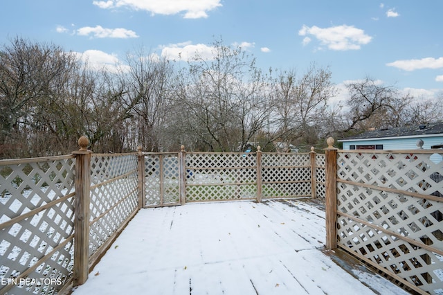 view of snow covered deck