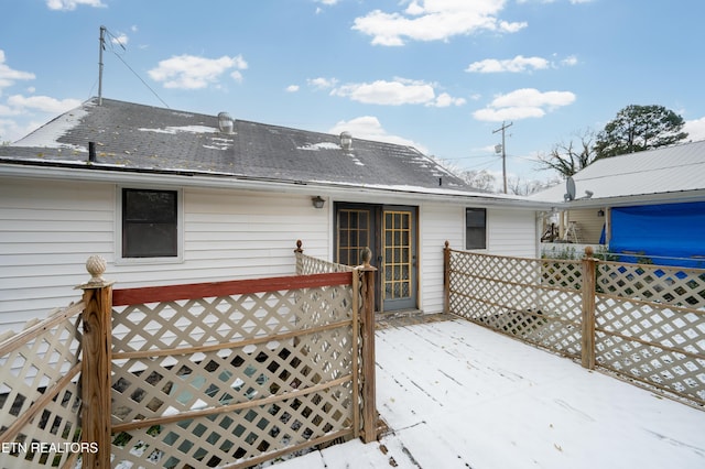 view of snow covered deck