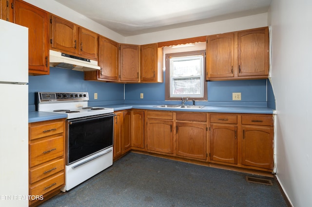 kitchen featuring white appliances and sink