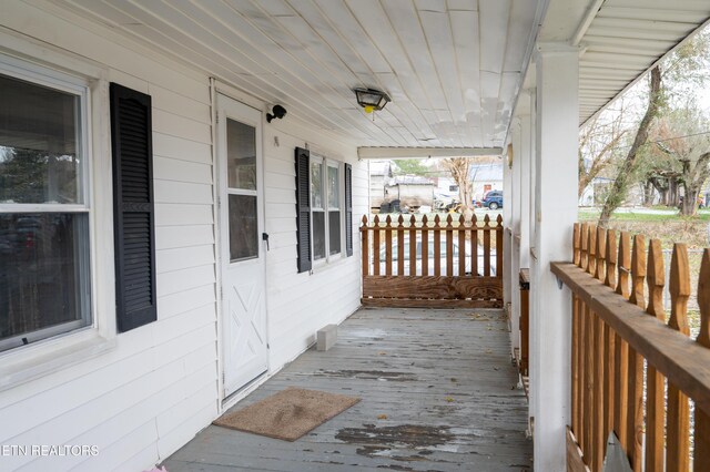 deck with covered porch