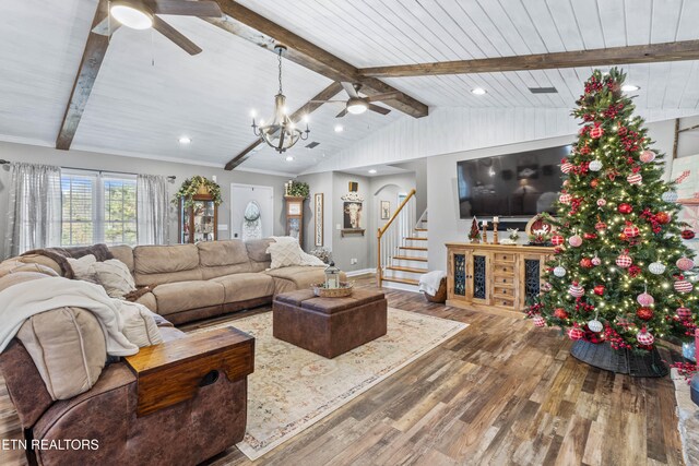 living room featuring wood ceiling, hardwood / wood-style floors, lofted ceiling with beams, and ceiling fan with notable chandelier