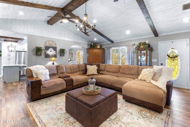 living room featuring beam ceiling, high vaulted ceiling, wood-type flooring, wood ceiling, and ceiling fan with notable chandelier