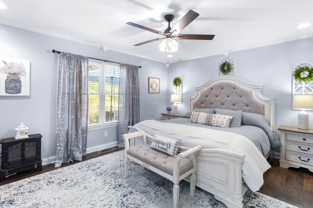 bedroom with ceiling fan, crown molding, and dark wood-type flooring