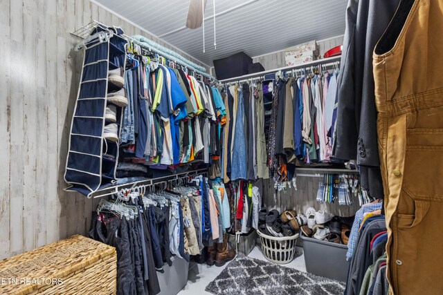 spacious closet featuring ceiling fan