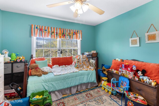 bedroom featuring ceiling fan