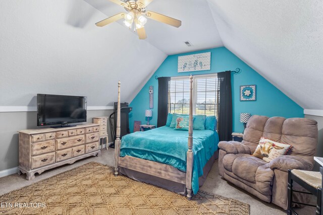 bedroom with ceiling fan, light colored carpet, and lofted ceiling