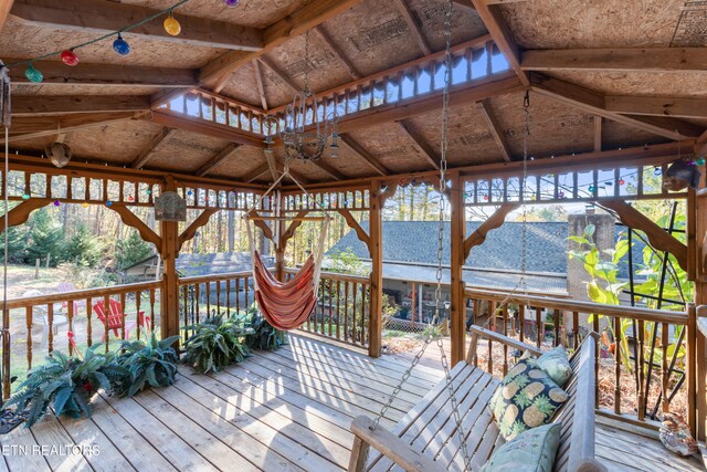 wooden deck with a gazebo