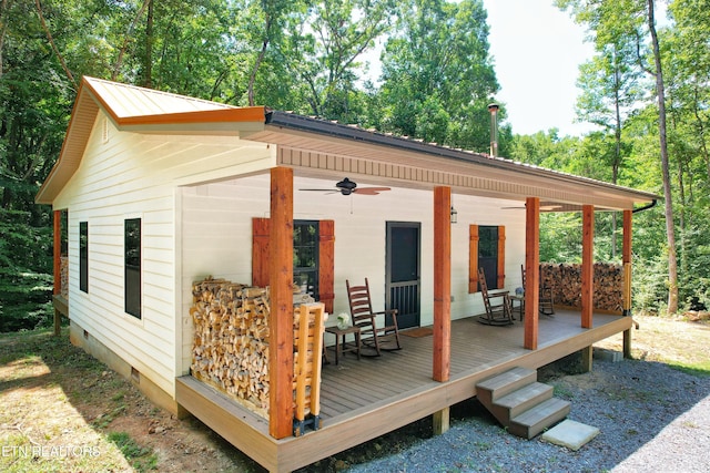 view of outbuilding featuring covered porch