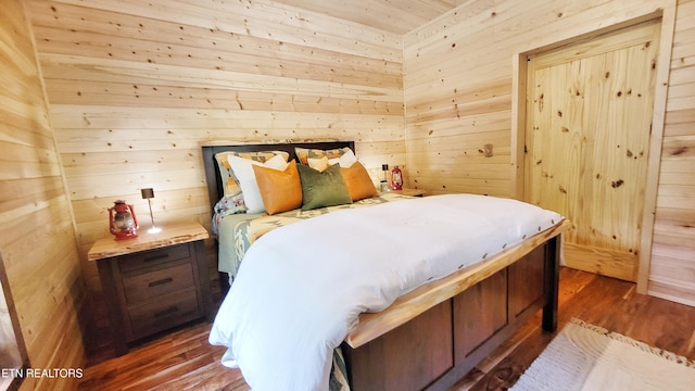 1312 Sweetwater Rd, Newport, TN 37821 - bedroom featuring wooden walls and wood finished floors