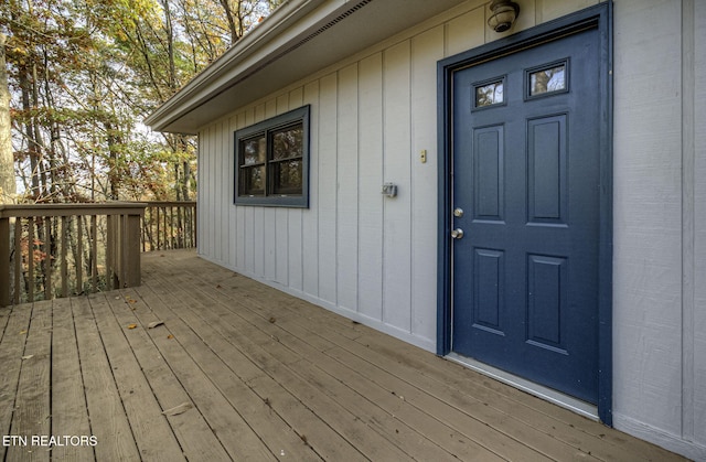 doorway to property with a deck