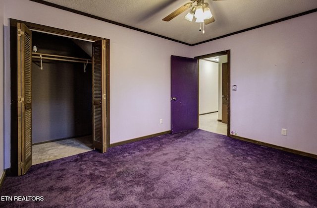 unfurnished bedroom featuring light carpet, crown molding, ceiling fan, a textured ceiling, and a closet