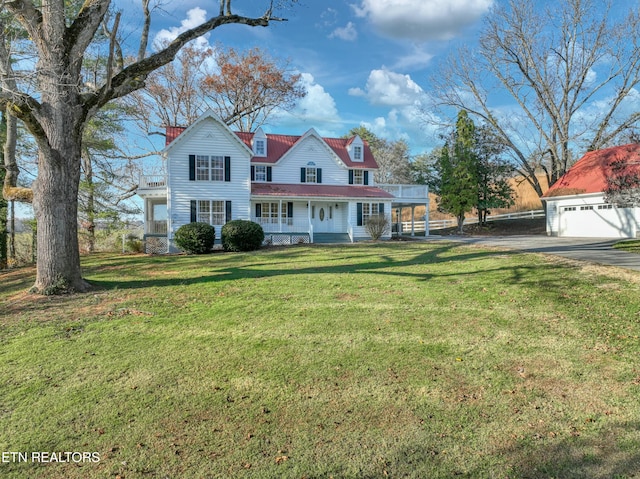 view of front of home featuring a front yard and covered porch