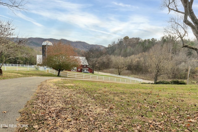 exterior space featuring a mountain view and a rural view