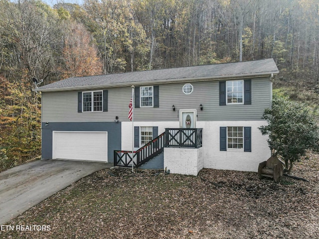 split foyer home featuring a garage