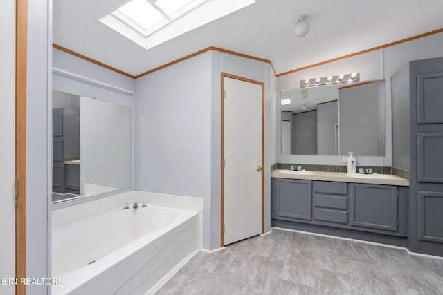 full bath featuring a bath, a sink, double vanity, wood finished floors, and ornamental molding