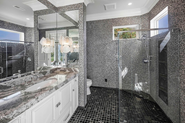 bathroom with vanity, tile patterned flooring, toilet, ornamental molding, and a shower with shower door