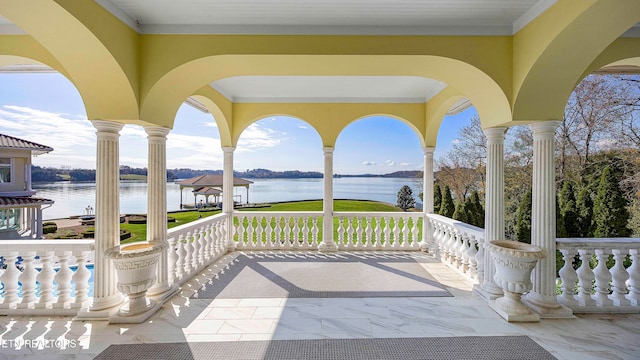 view of patio / terrace featuring a water view