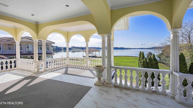 view of patio featuring a water view