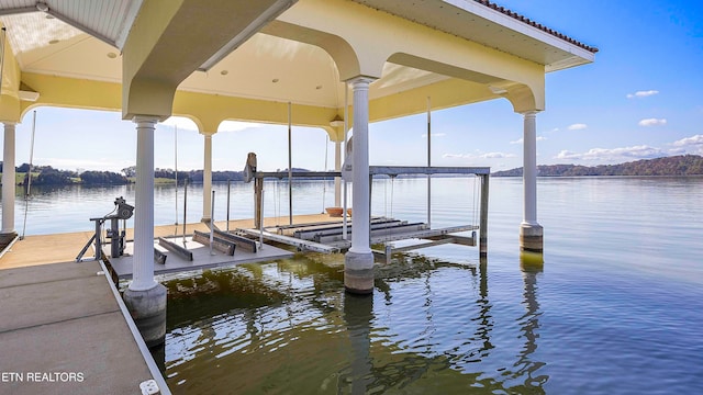 dock area with a water view