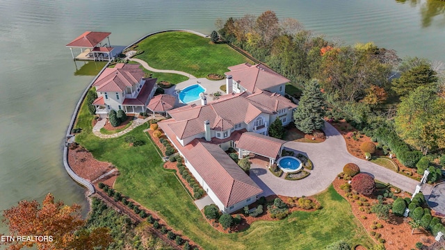 bird's eye view with a water view