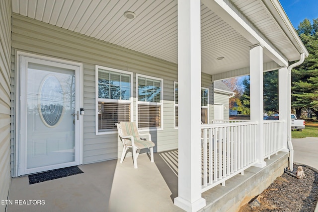 property entrance with a porch