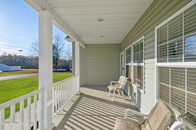 balcony featuring covered porch