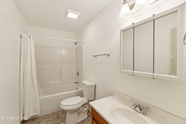 full bathroom with shower / bath combo, vanity, and toilet