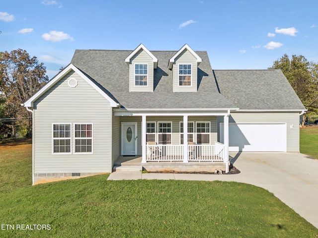 cape cod house with covered porch, a front yard, and a garage