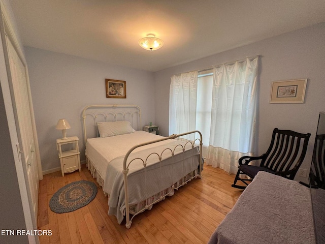 bedroom featuring light hardwood / wood-style floors