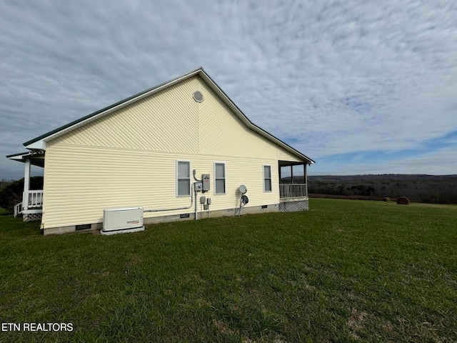 view of property exterior featuring a yard