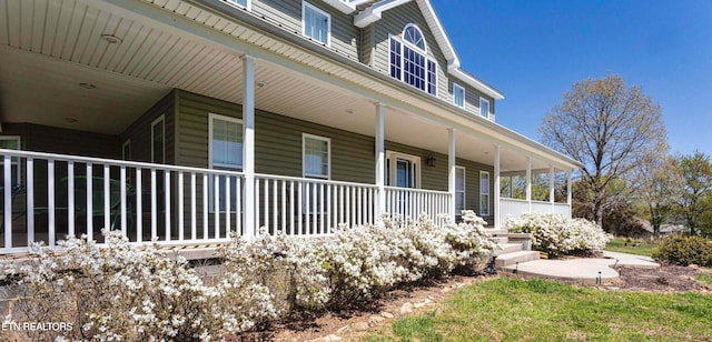 doorway to property with a porch