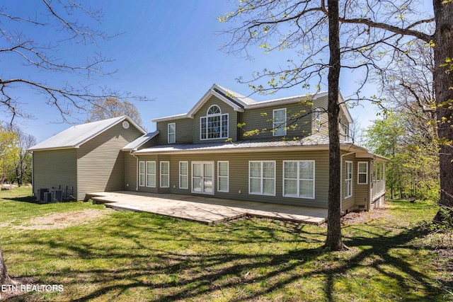 back of house with a yard, central AC, and a patio area